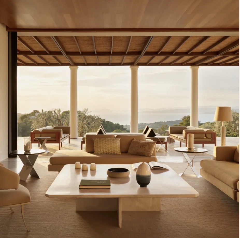 An open loggia with sofas looking out over the sea